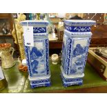 A pair of 20th century blue & white Chinese vaseson conforming stands, total height 16«in. (