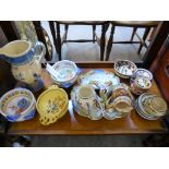 A large quantity of Faience Quimper pottery to include a Desvres dish and HB jugs (23)