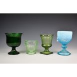 A Victorian blue pearline glass goblet, 7¬in. (18.4cm.) high, together with a green pillar glass,