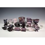 A quantity of various Victorian purple malachite glassware, to include a spill vase with dolphin