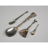 A Victorian cast silver annointing spoon, Charles Boynton, London 1883; together with a Hanau