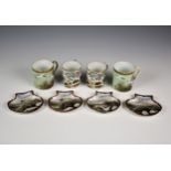 A set of four Japanese Satsuma porcelain dishes, early 20th century, of scallop shell form,