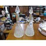A pair of silver mounted cut glass cordial decanters (one stopper a/f)