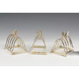 A set of three silver Art Deco four section toast racks, William Neale & Sons, 1937, two Chester the