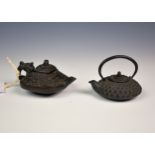 Two Chinese miniature bronze and cast iron teapot water droppers, the bronze example of rounded