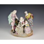 A 19th century Meissen porcelan figural group of a family playing/listening to music, blue crossed