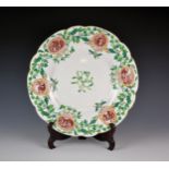 A large Edwardian Royal Worcester Vitreous Christmas plate, the centre with a sprig of mistletoe and