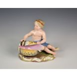 A 19th century Meissen porcelain figure, of a young girl seated beside a upturned large shell on
