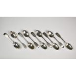 Nine silver fiddle pattern Guernsey Militia teaspoons, Hallmarked London, overstruck maker's marks