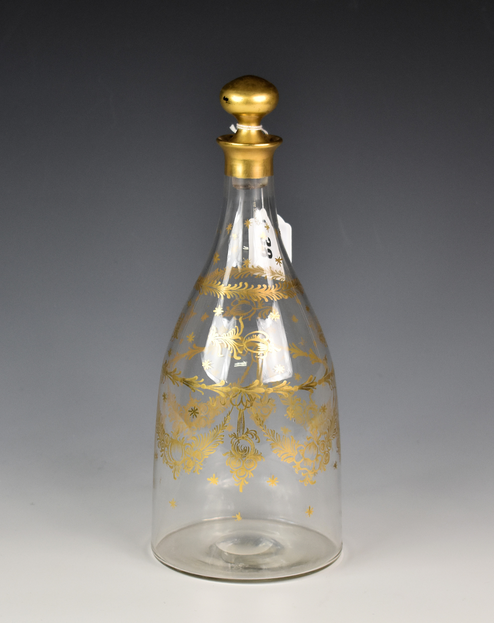 A Victorian hand-blown glass decanter with gilt decoration., 11«in. (29.2cm) high.