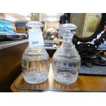 A pair of Georgian cut glass crystal decanters.