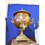 A 19th century copper and brass samovar of typical form, 19óin. (50cm.) high.