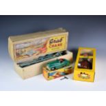 A vintage boxed Tri-ang No. 2 Minic sports car, in green, original key, working horn, excellent/near