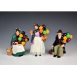 Three Royal Doulton figurines, comprising of The Old Balloon Seller, HN1315; The Balloon Man,