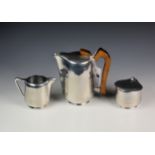 A 1950s Newmaid modernist cast aluminium three piece coffee set, comprising coffee pot; cream jug;