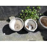 Three composite stone planters with decoration (3)