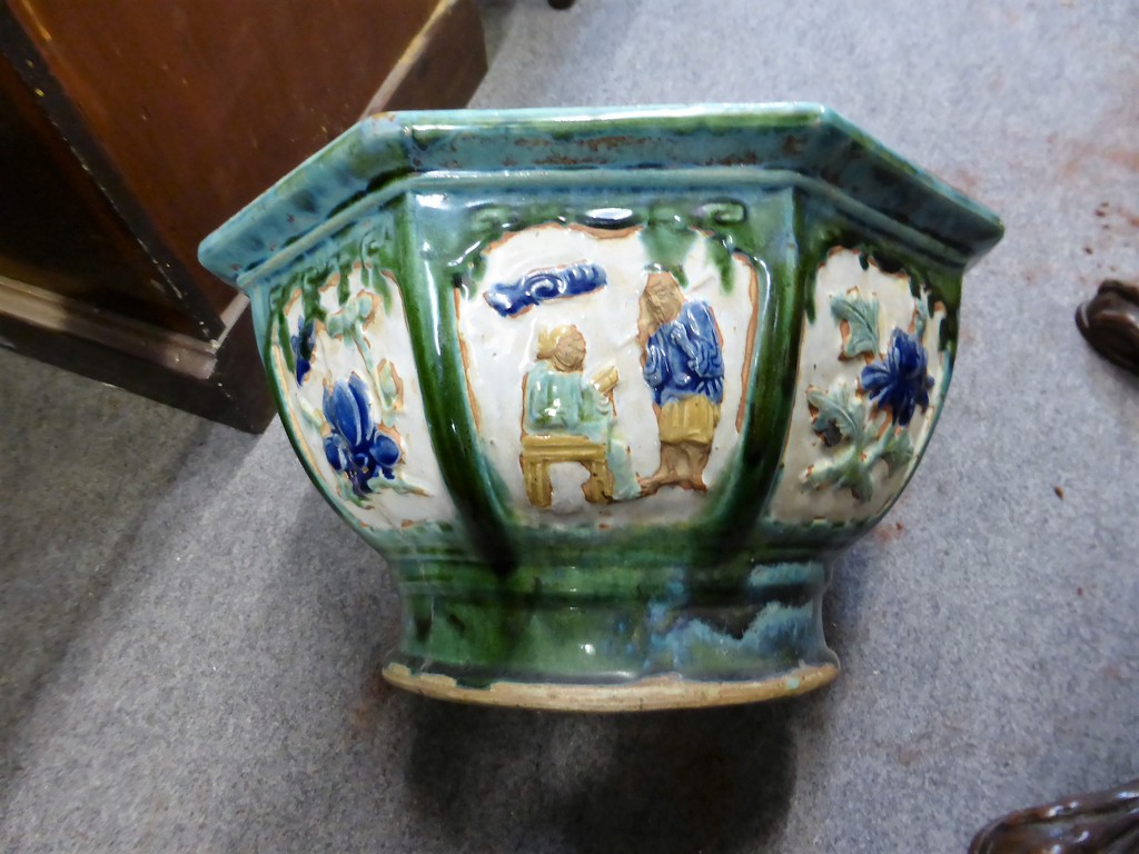 A Chinese 19th century octagonal jardiniere, the reserves decorated with figural & floral