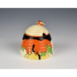 A Clarice Cliff Beehive honey pot & cover, the hand painted honeyglaze pot in the Woodland