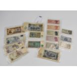 A collection of various Worldwide vintage banknotes.