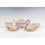 A second period Belleek Neptune porcelain tea set for two, comprising teapot and cover, cream jug,