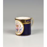 A late 18th century Sevres soft paste porcelain coffee can, with interlaced Ls in gilt and a gilt '