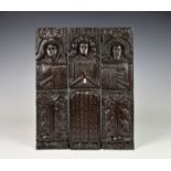 A matched set of three 17th /18th century carved oak caryatid panels, with later restoration to