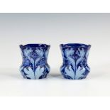 A pair of William Moorcroft for J. MacIntyre & Co. jardinière form vases, c.1900, the thistle form