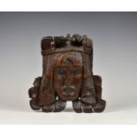 A 16th / 17th century carved oak mask plaque, the mask of a young man wearing a crown, carved with