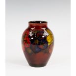 A Moorcroft flambé glazed clematis pattern vase, post-war, 1950s, ovoid form with short upstanding