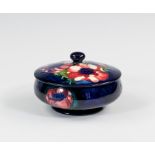 A Moorcroft anemone pattern covered dish, 1930s, of bun form with short waisted foot and slightly