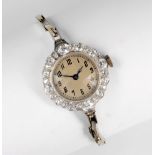 A platinum and diamond ladies cocktail watch, 1930s-50s, the 15 jewel Swiss manual movement with
