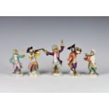 A matched set of five Continental porcelain monkey band figures, including two 20th century