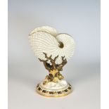 A Royal Worcester nautilus shell vase, impressed and green printed factory marks, the iridescent