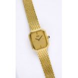 A 14ct gold Seiko ladies wrist watch, the tonneau shaped champagne dial signed 'Seiko Quartz Japan