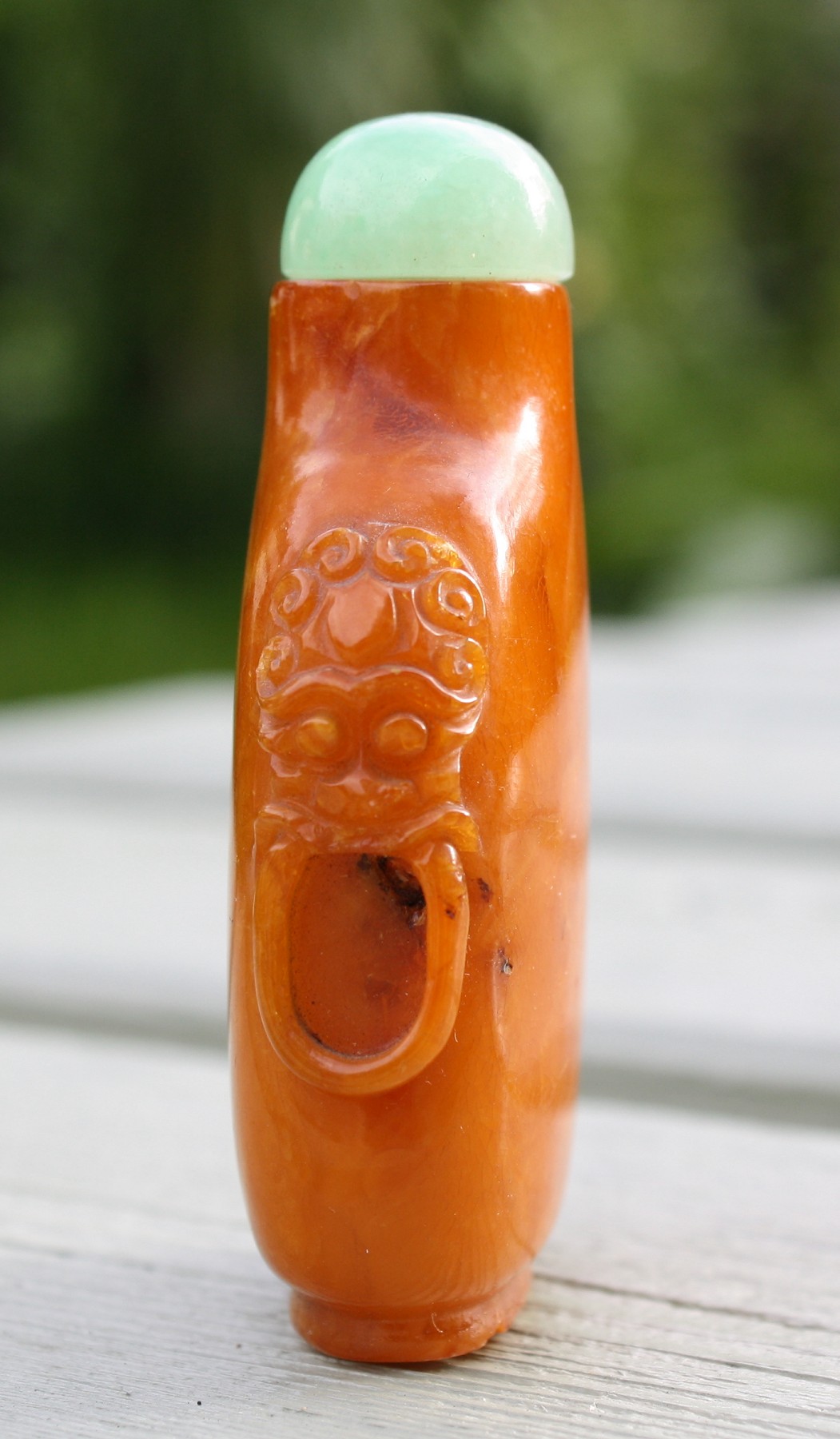 A Chinese egg yolk amber snuff bottle, 18th / 19th century, rounded straight sided form, relief - Image 10 of 11