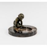 An Art Deco style bronze & variegated black marble figural ashtray, 1920s-30s, mounted with a bronze