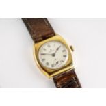 A Rolex cushion cased 9ct gold gentleman's manual wrist watch, 1930s, the circular 21mm. silvered