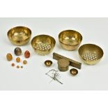 A set of four brass pearl diving sieves, probably early 20th century, United Arab Emirates, each
