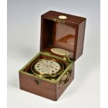 A fine early 19th century cased Marine Chronometer, the 3¾in. (9.5cm.) silvered Roman dial