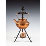 Carl Deffner (1856-1948) - an Arts & Crafts copper and brass kettle on burner stand, the kettle of