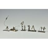 Five miniature silver figures, comprising of golfer in full swing; fisherman in rowing boat; boy