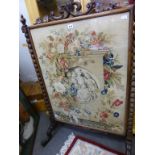 A William IV rosewood tapestry fire screen.