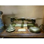 A set of early 20th century W. & T. AVERY LTD postal scales,the large set of brass scales of typical