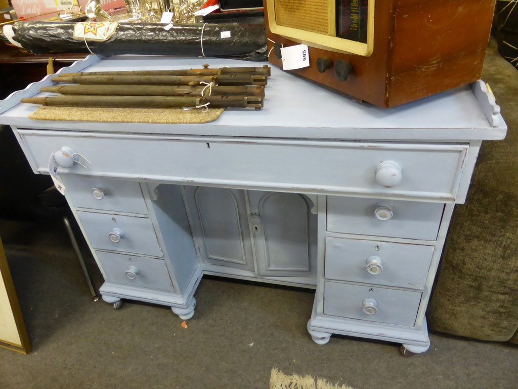 A pale blue painted Victorian desk.