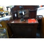 A late Victorian mahogany mirror back chiffonier