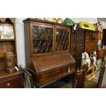 A mahogany bureau bookcase with astragal glazing, circa 1900's, 179cm x 126cm.