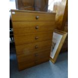 A vintage mid century Avalon teak chest of drawers.
