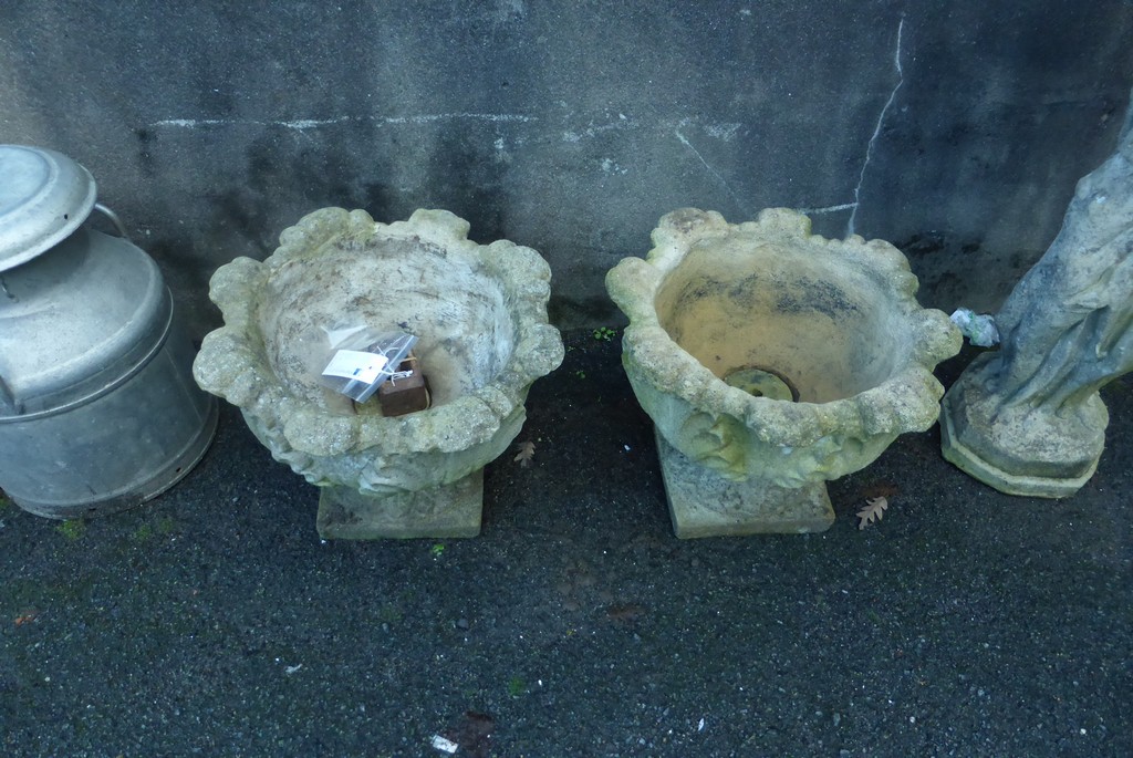 Two composite stone planters.