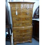 A small reproduction mahogany and burr walnut tallboy.