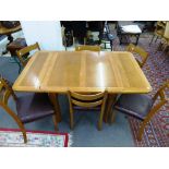 Light Oak, mid century, pull out extention dining table, with 6 chairs.